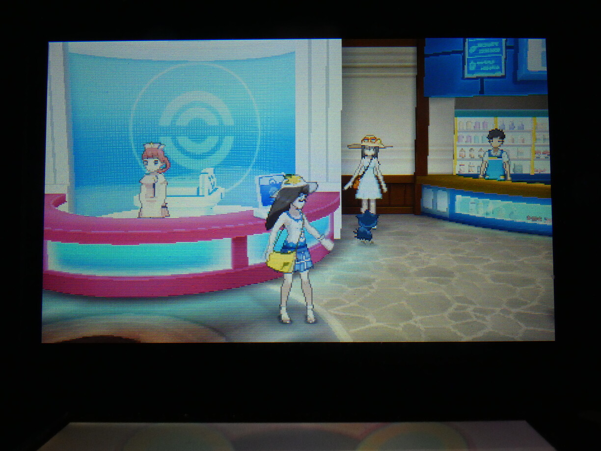 The same but in a Pokémon center and she is looking to the right but also as a part of the idle animation.