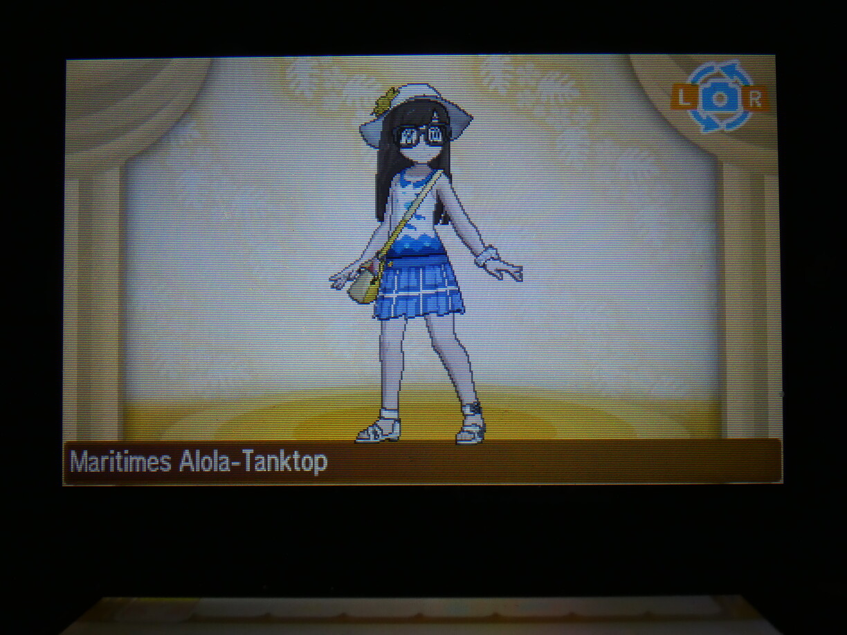 Screenshot from the game showing my entire character in the clothing select screen. She’s wearing a white tank top with blue fishes and a blue pattern at the bottom that looks like the sea and a more or less matching short blue skirt, and also a yellow shoulder bag and white strap sandals.